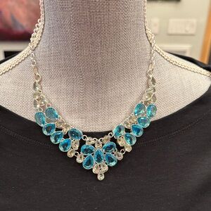 Elegant Blue topaz and crystal Sterling silver handmade from India.